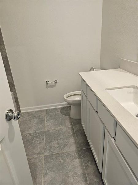 Furnished interior view inside a new home in Storey Creek: Estate Collection, Kissimmee (Image 7).