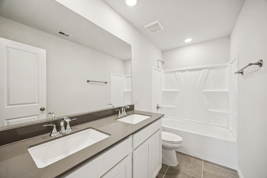 Furnished interior view inside a new home in Saint Tropez, Huffman (Image 4).