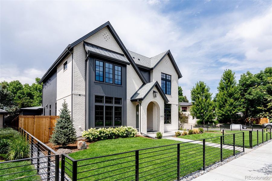 Front exterior of a new home in , Denver, CO, highlighting curb appeal (Image 21).