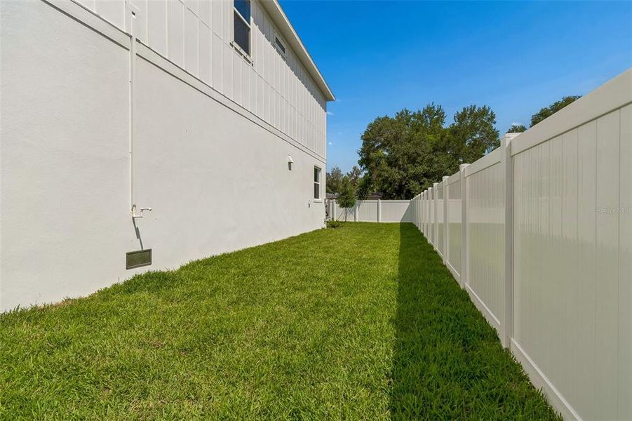 Exterior details and patio area of a home in , Tampa (Image 38).