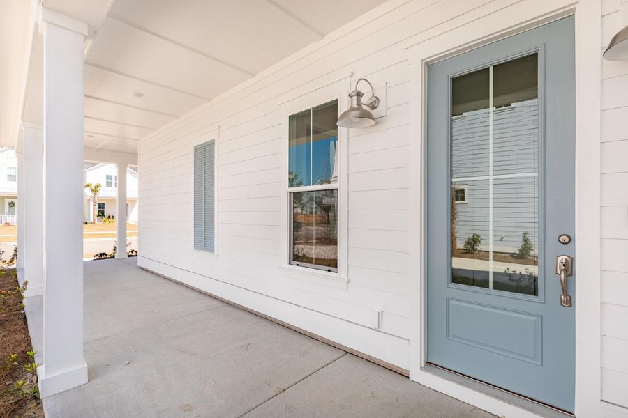 Exterior details and patio area of a home in Heron's Walk at Summers Corner, Summerville (Image 3).