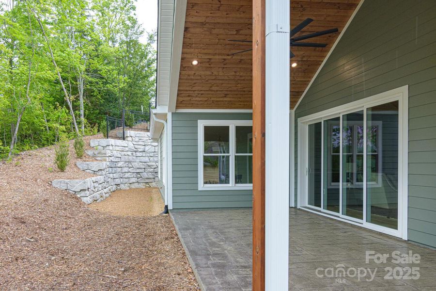 Front exterior of a new home in , Hendersonville, NC, highlighting curb appeal (Image 1).