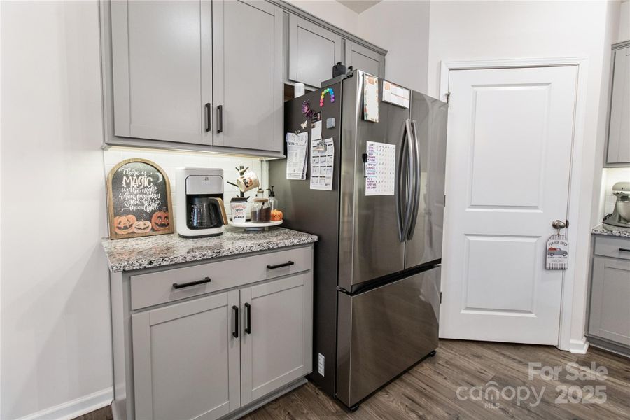 Corner of kitchen with walk in pantry Corner of kitchen with walk in pantry