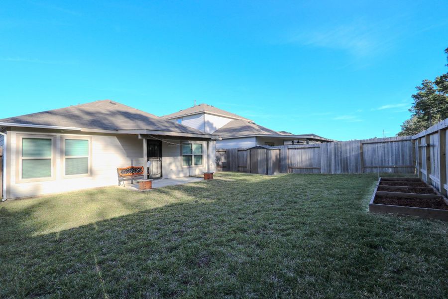 Backyard of the house, including storage shack give-away. Backyard of the house, including storage shack give-away.