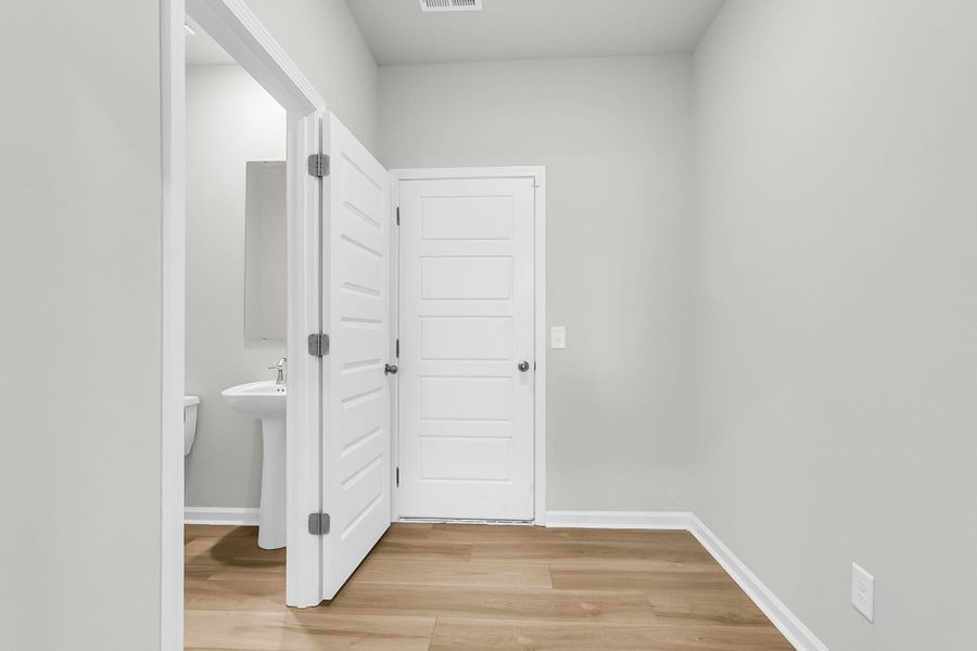 Spacious, unfurnished interior of a new home in Limehouse Village: Arbor Series, Summerville (Image 53).