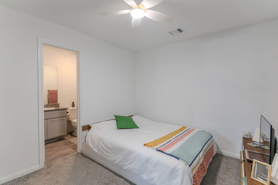 Primary bedroom downstairs. Primary bedroom downstairs.