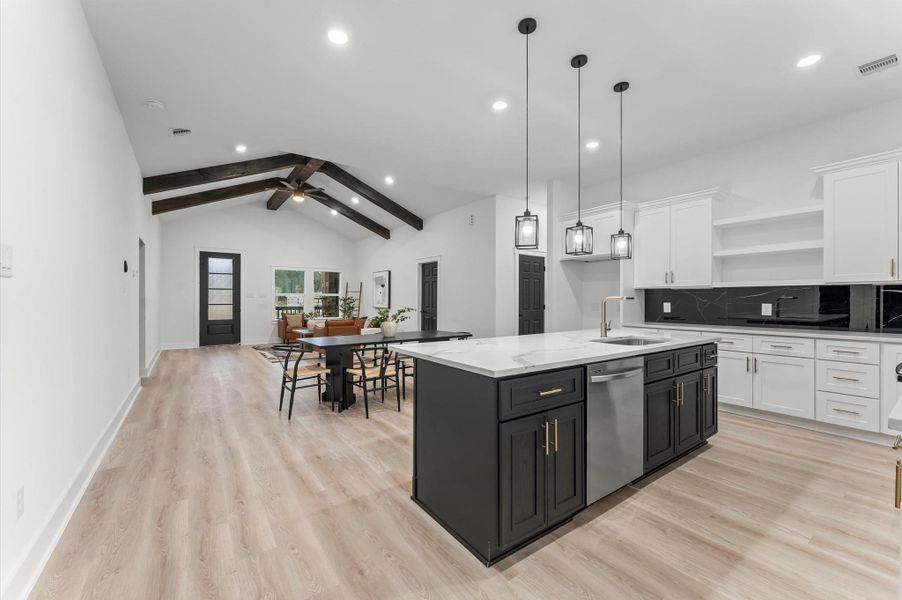 Open layout connecting perfectly to the dining and living spaces. Open layout connecting perfectly to the dining and living spaces.