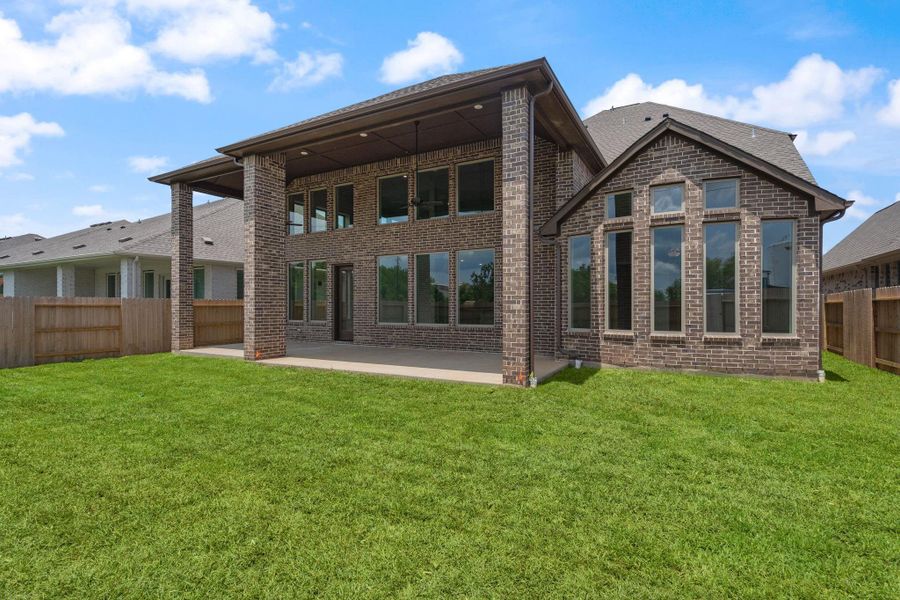 Front exterior of a new home in Coastal Point, League City, TX, highlighting curb appeal (Image 19).