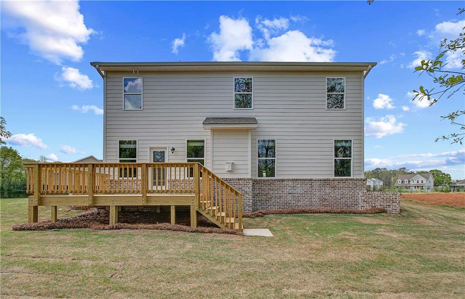 Front exterior of a new home in Cooper Park, McDonough, GA, highlighting curb appeal (Image 16).