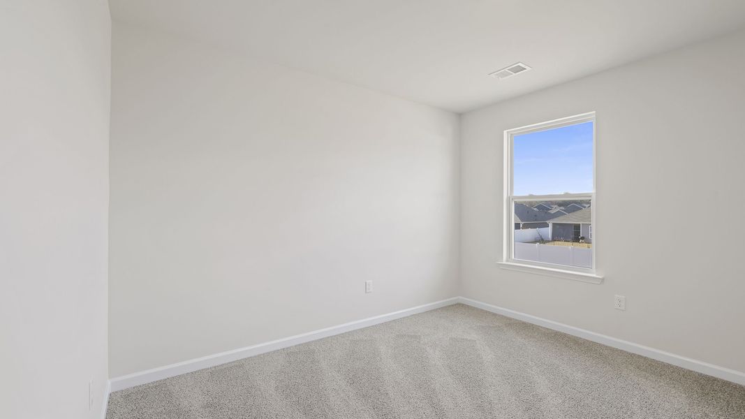 Spacious, unfurnished interior of a new home in Bentley Park, Greenwood (Image 20).