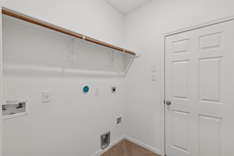 Laundry room (*Photo not of actual home and used for illustration purposes only.)