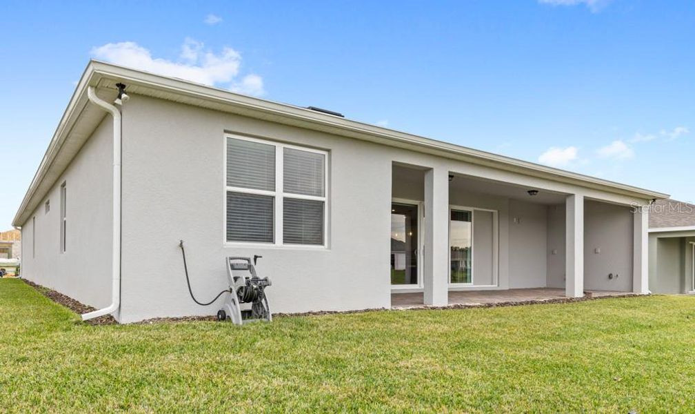 Exterior details and patio area of a home in Foothills Preserve, Mount Dora (Image 4).