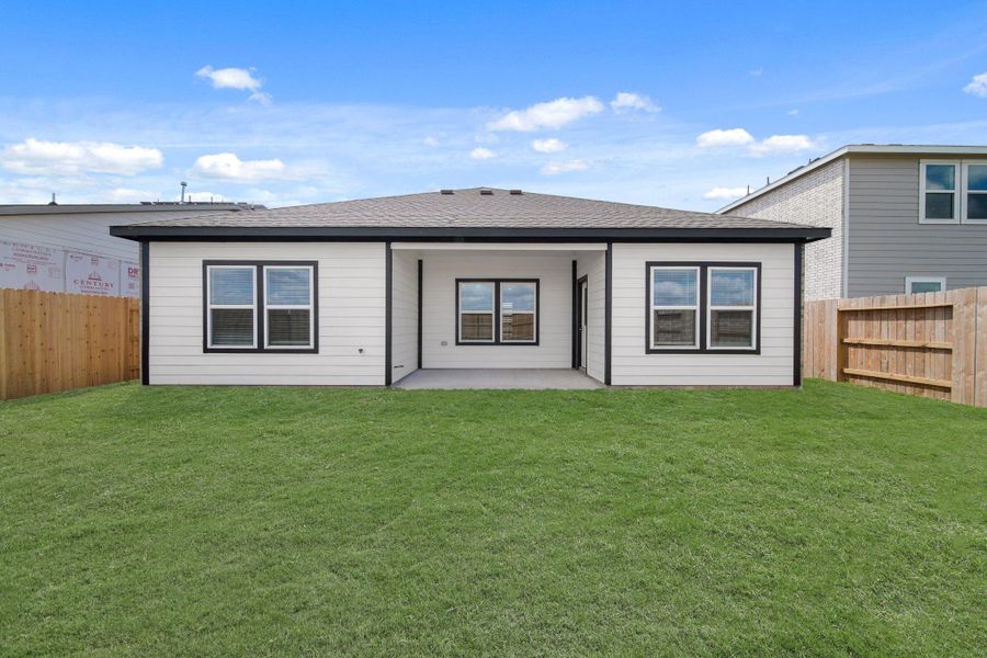 Exterior details and patio area of a home in Sunterra Lakes, Brookshire (Image 17).