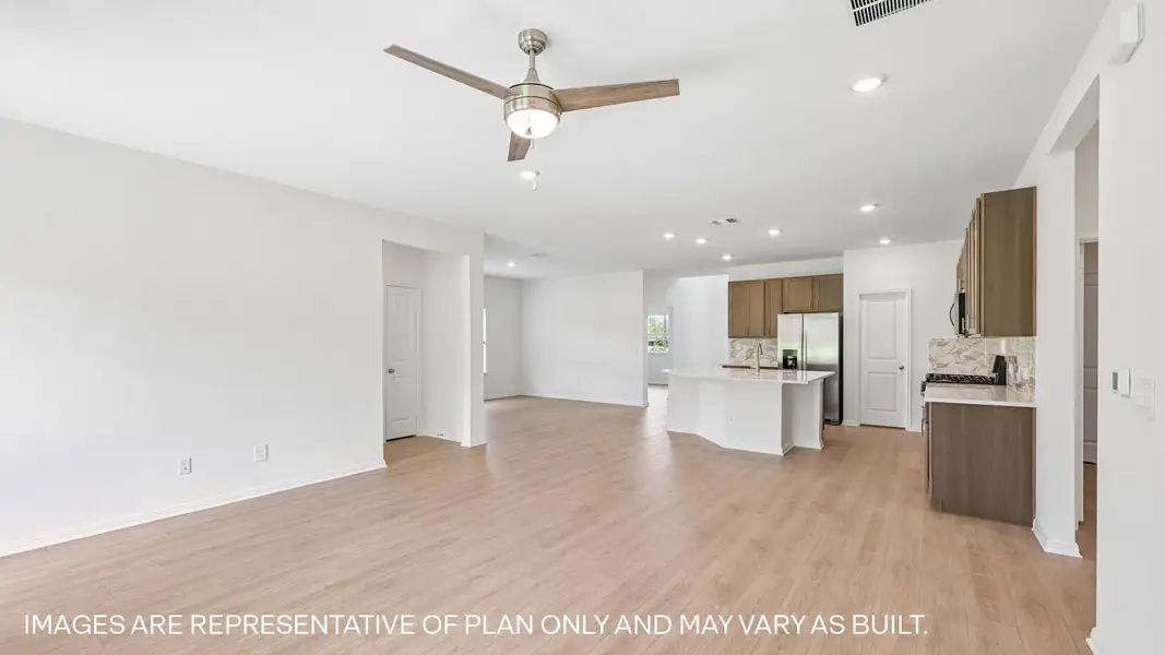 Representative unfurnished interior of a home built from the The Kemah by D.R. Horton in Revelry, Del Valle (Image 17).
