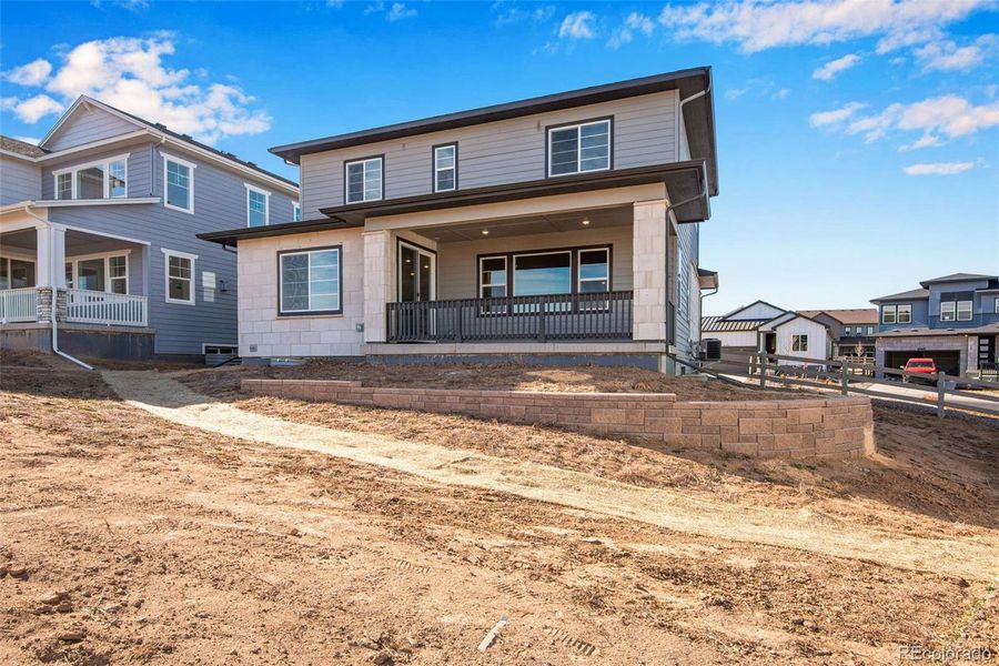 Exterior details and patio area of a home in Prelude at Sterling Ranch, Littleton (Image 28).
