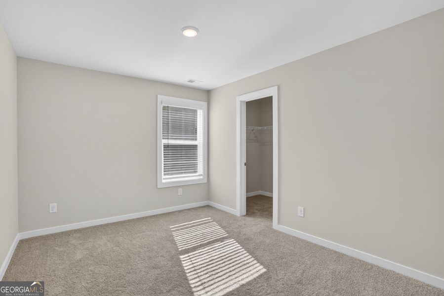 Spacious, unfurnished interior of a new home in The Fairways at Mirror Lake, Villa Rica (Image 51).