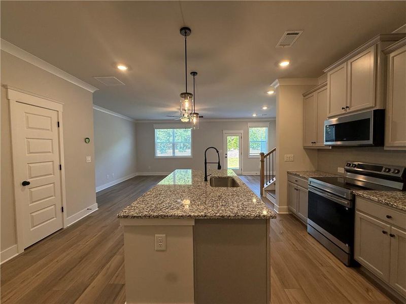 Furnished interior view inside a new home in The Towns at Auburn Station East, Auburn (Image 7).