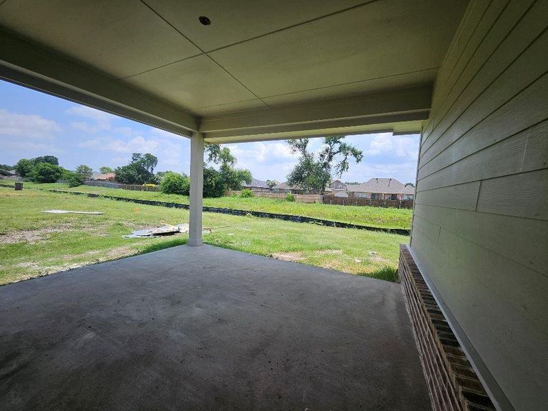 Exterior details and patio area of a home in The Hollow, Ennis (Image 3).
