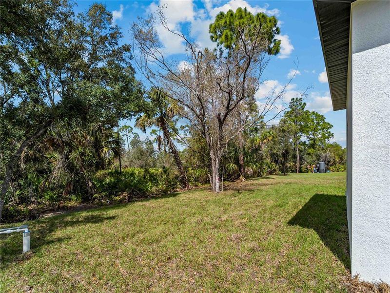 Exterior details and patio area of a home in , North Port (Image 33).