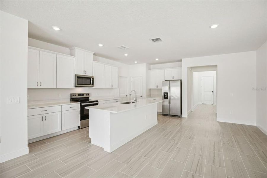 Furnished interior view inside a new home in Cyrene at Minneola - Villas, Minneola (Image 6).