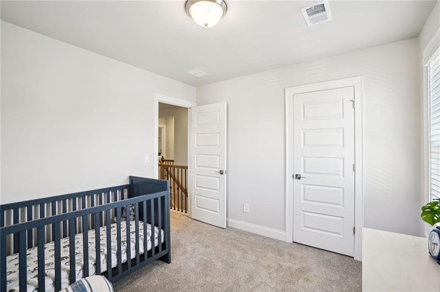 Furnished interior view inside a new home in Hemingway - Reserve Series, Cumming (Image 32). Furnished interior view inside a new home in Hemingway - Reserve Series, Cumming (Image 32).