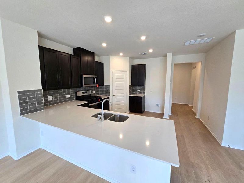 Furnished interior view inside a new home in Salerno - Heritage Collection, Round Rock (Image 8). Furnished interior view inside a new home in Salerno - Heritage Collection, Round Rock (Image 8).