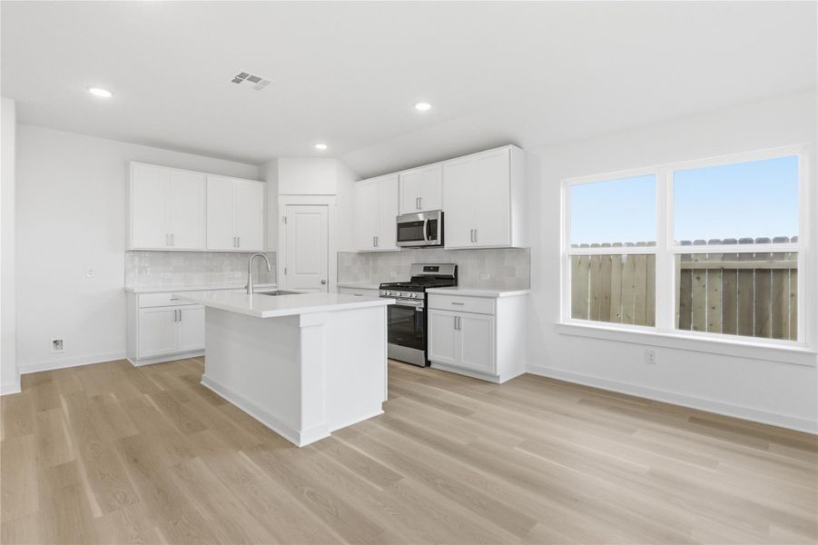 Furnished interior view inside a new home in Infinity Square, Kyle (Image 12).