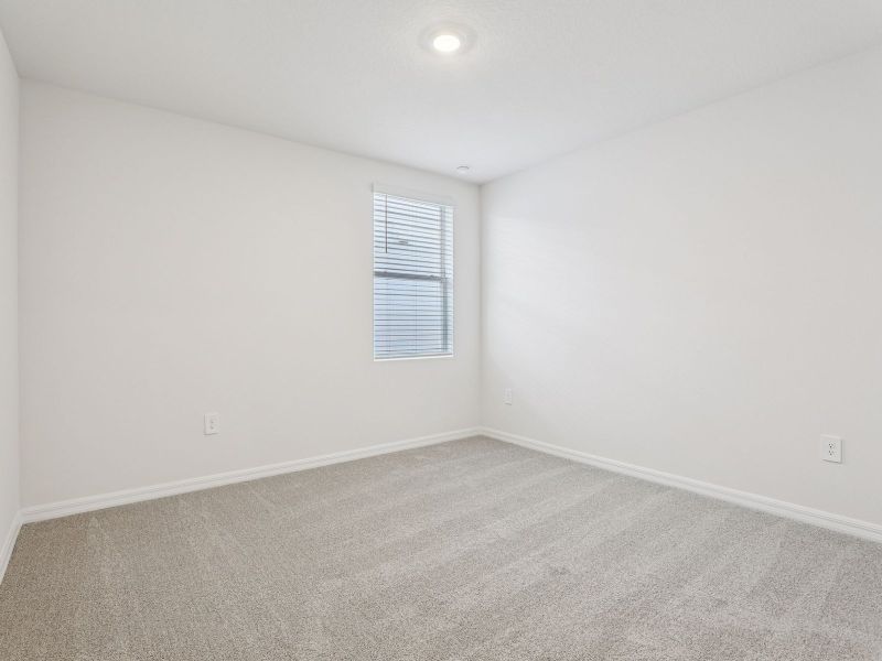 Spacious, unfurnished interior of a new home in Lake Deer Estates - Signature Series, Poinciana (Image 12).