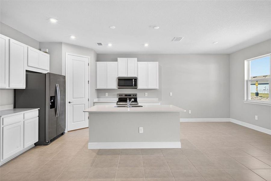 Furnished interior view inside a new home in Windwater, Parrish (Image 6).