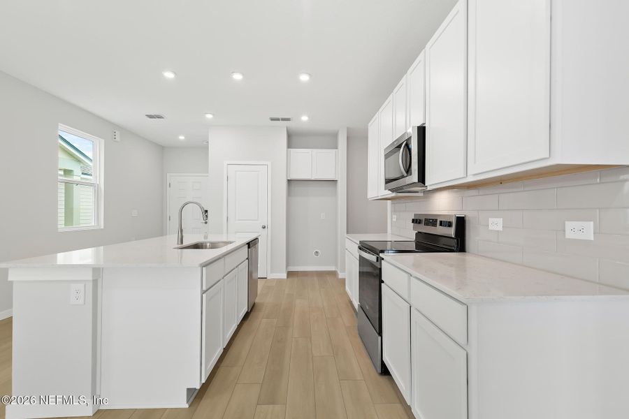 Furnished interior view inside a new home in The Landings at Pecan Park, Jacksonville (Image 3). Furnished interior view inside a new home in The Landings at Pecan Park, Jacksonville (Image 3).