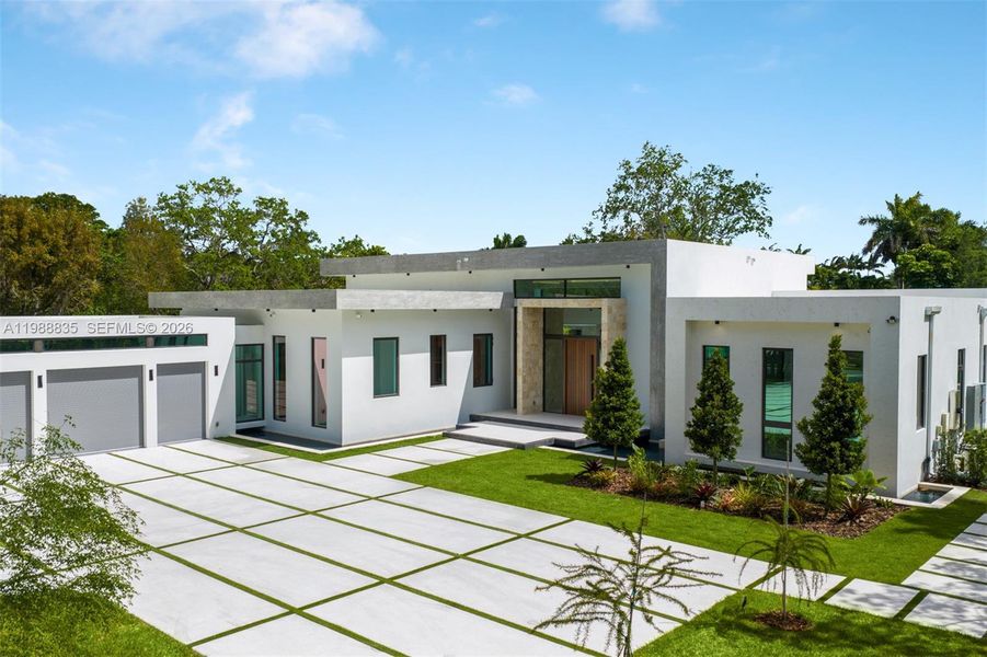 Front exterior of a new home in , Miami, FL, highlighting curb appeal (Image 18).