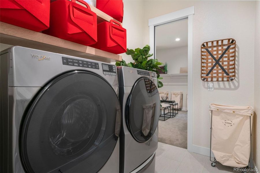 Main Floor Laundry/mud room with pass through to primary closet