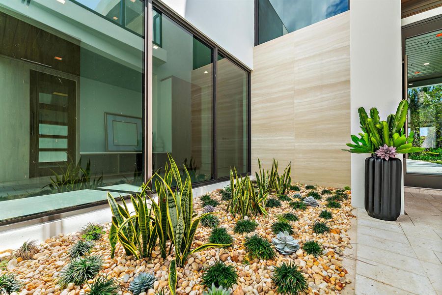 Exterior details and patio area of a home in , Jupiter Island (Image 26).