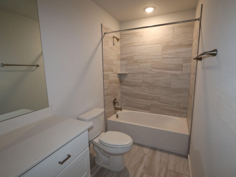 Furnished interior view inside a new home in Edgewood, Leander (Image 9). Furnished interior view inside a new home in Edgewood, Leander (Image 9).