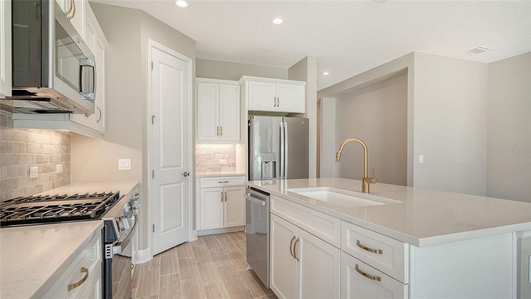 Furnished interior view inside a new home in Wildleaf at North River Ranch, Parrish (Image 9).