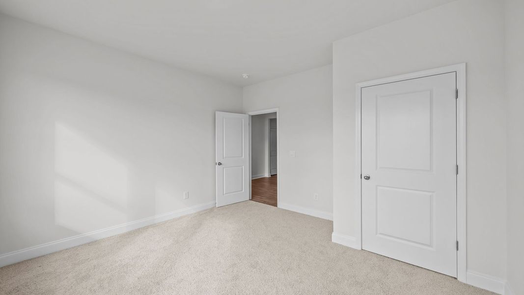 Spacious, unfurnished interior of a new home in Villa Grande, Winterville (Image 23).