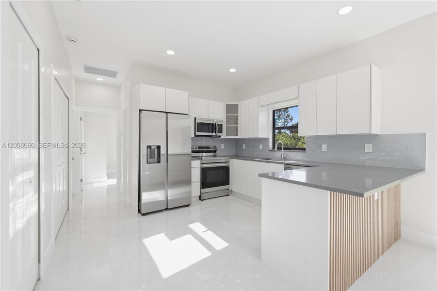 Furnished interior view inside a new home in , Lehigh Acres (Image 13).