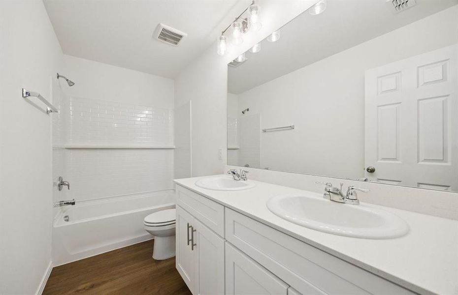 Spacious secondary bathroom with double vanity Spacious secondary bathroom with double vanity