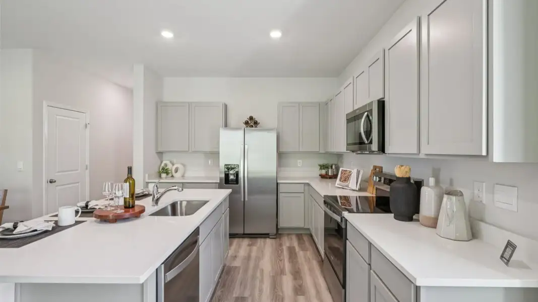 Furnished interior view inside a new home in Towns at Woodsdale, Wesley Chapel (Image 13).