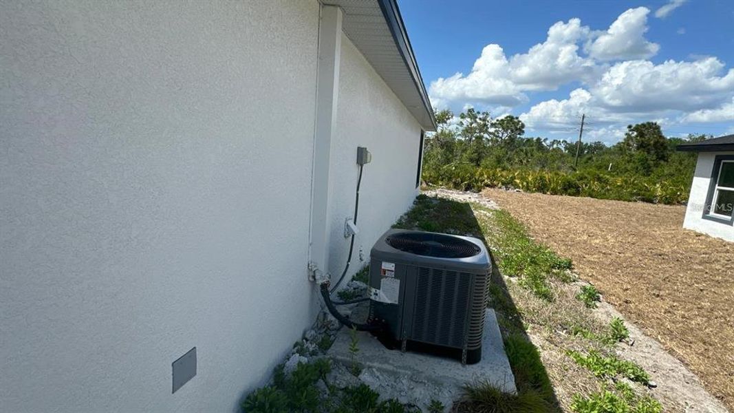 Exterior details and patio area of a home in , Port Charlotte (Image 18).