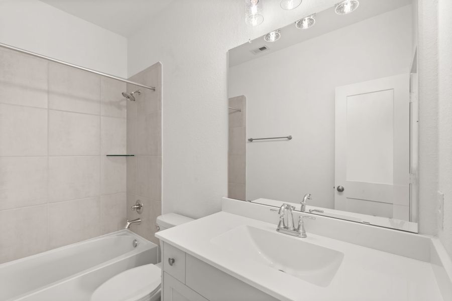 Furnished interior view inside a new home in Elyson, Katy (Image 11).