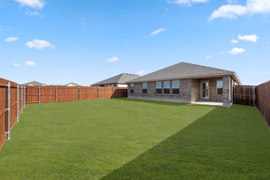 Representative exterior photo of a completed home built from the Cheyenne by Impression Homes in ValleyBrooke, Mesquite, TX (Image 26).