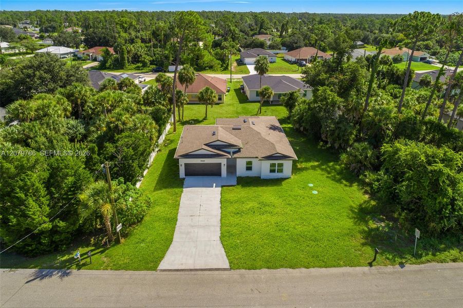 Front exterior of a new home in , North Port, FL, highlighting curb appeal (Image 2). Front exterior of a new home in , North Port, FL, highlighting curb appeal (Image 2).