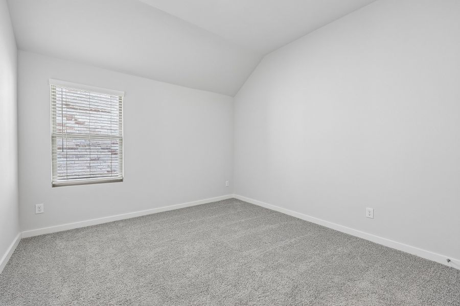 Bedroom in the Gilmour II home plan by Trophy Signature Homes