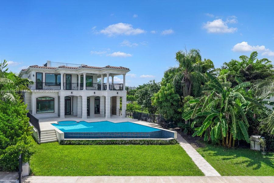 Front exterior of a new home in , Surfside, FL, highlighting curb appeal (Image 23).