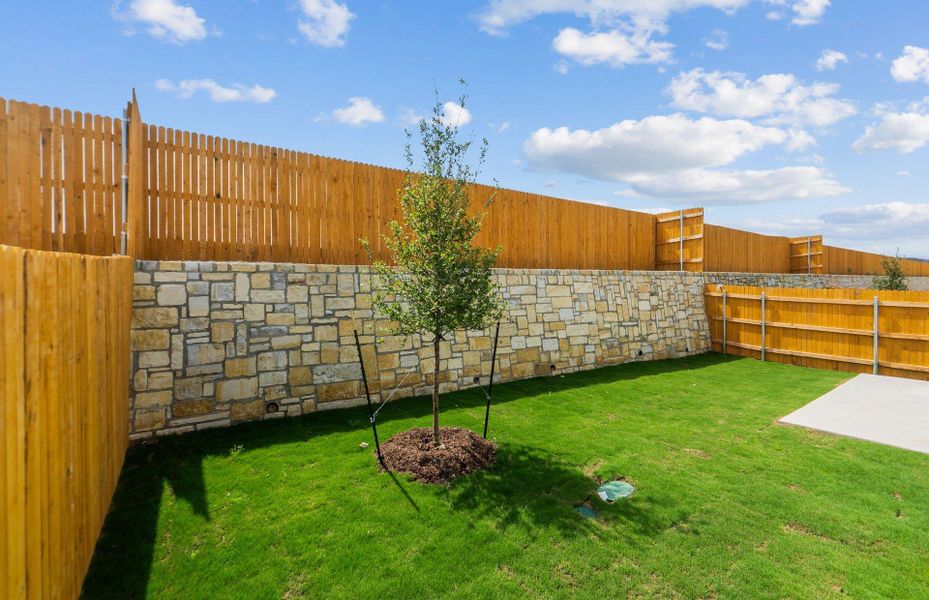 Exterior details and patio area of a home in Cameron Place, Manor (Image 20).