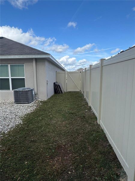 Exterior details and patio area of a home in Autumn Glen, Belleview (Image 17).