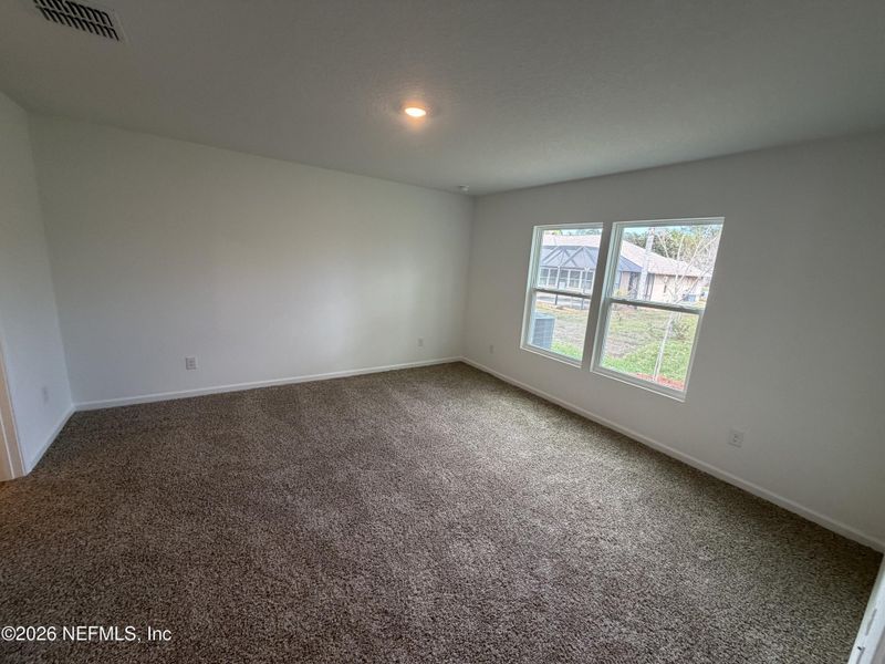 Spacious, unfurnished interior of a new home in Grand Reserve, Bunnell (Image 21).