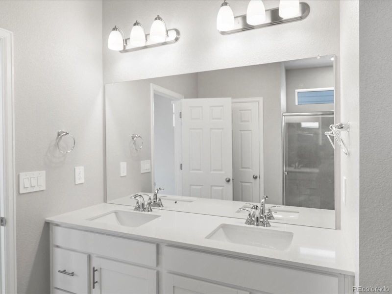 Furnished interior view inside a new home in Buffalo Highlands: The Canyon Collection, Commerce City (Image 12).