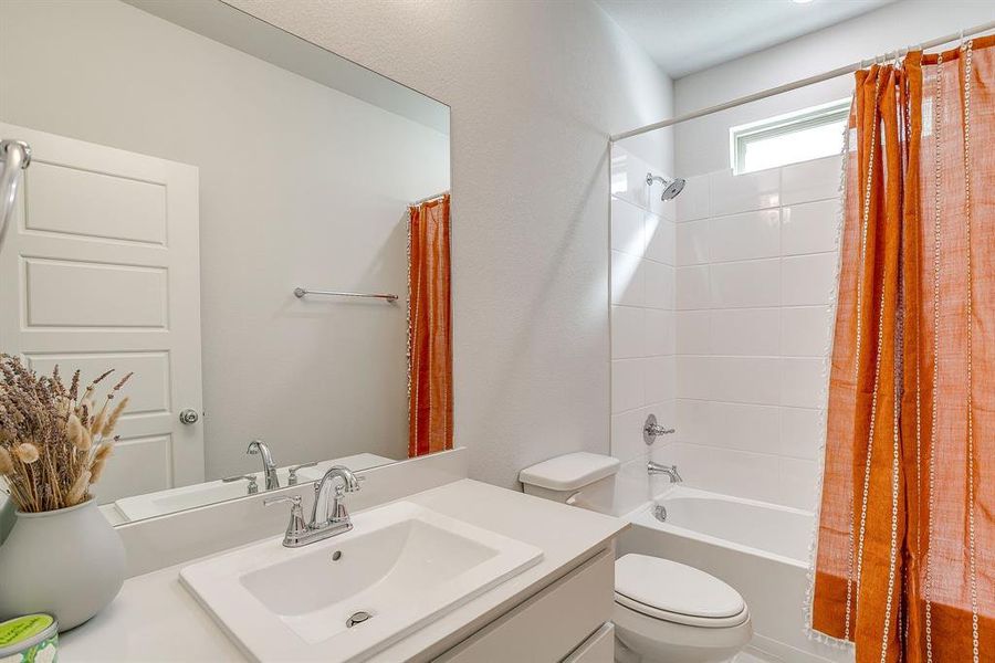 Bathroom with shower / bath combo and vanity Bathroom with shower / bath combo and vanity